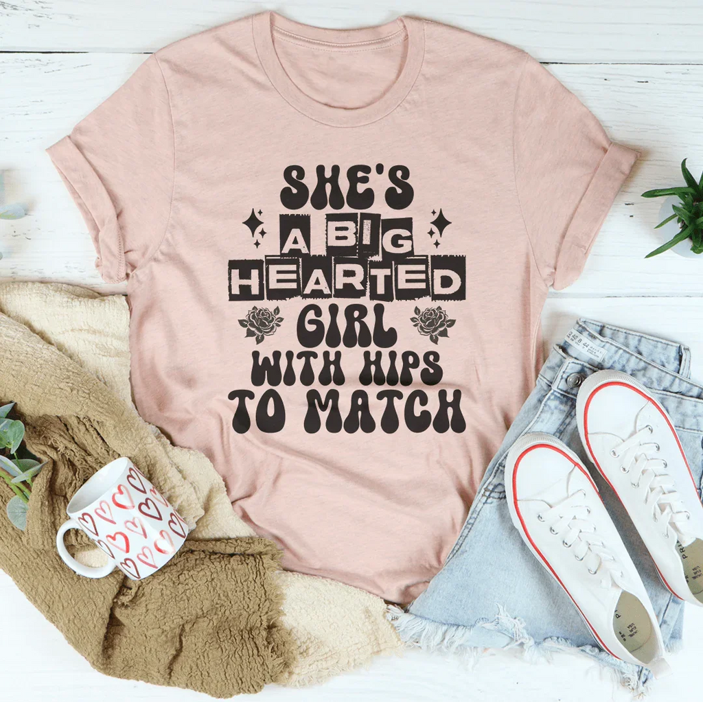 She's a big hearted girl with hips to match Tee