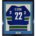 Framed Autographed/Signed Daniel Sedin 35x39 Vancouver Blue Hockey Jersey JSA COA Holo Only